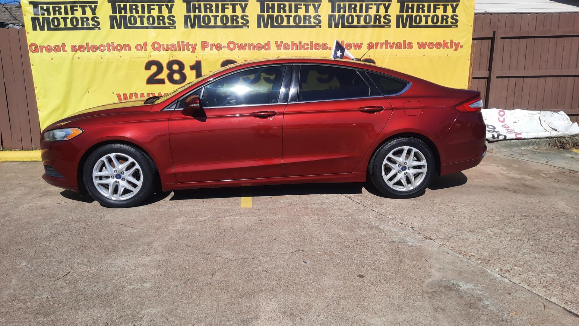 2016 Ford Fusion (3FA6P0H70GR) , located at 16710 Clay Rd., Houston, TX, 77084, (281) 859-7900, 29.834864, -95.656166 - Photo#1